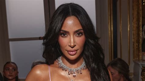 Kim Kardashian's tiny Gucci bikini 'cringes' out fans as she  .